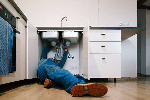 Professional Emergency Plumber technician working in Dewitt, KY
